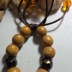 Pulsera Artesanal con decorados de esferas naranja
